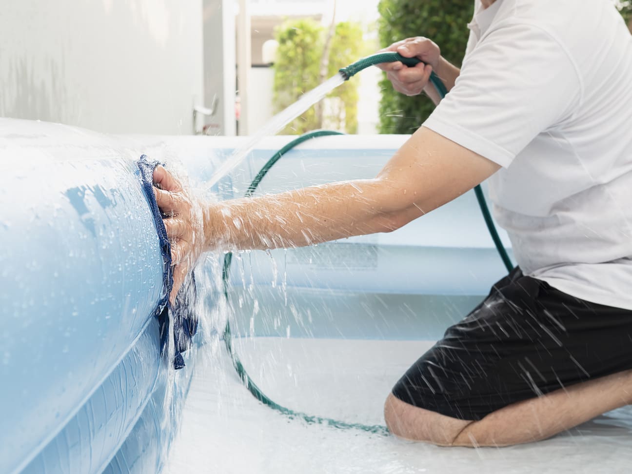 Cleaning big rubber toy pool