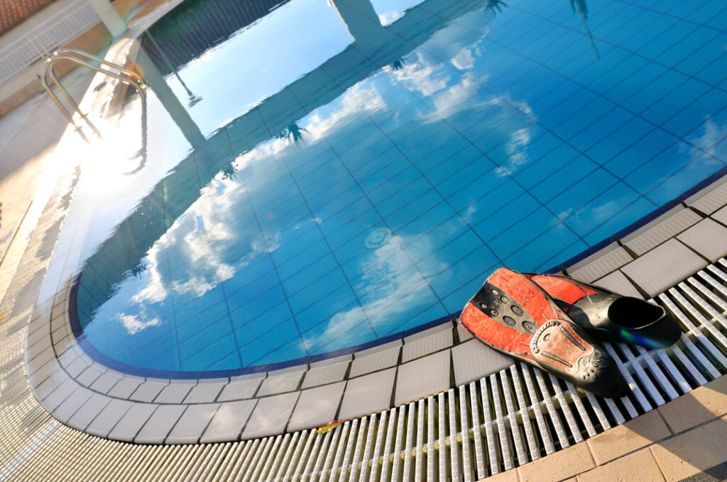 scuba on the edge of outdoor pool 2